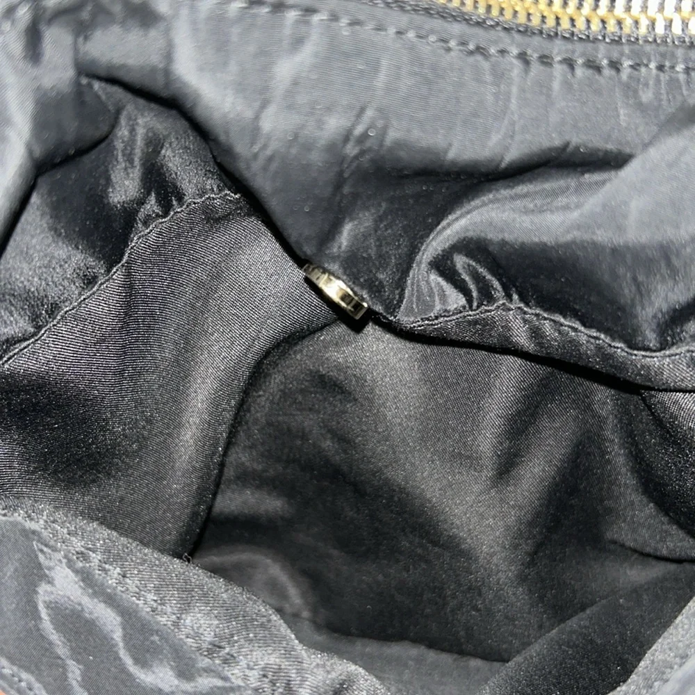 MADDEN GIRL Black Crossbody with Gold Accents. On trend and super convenient.